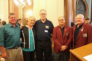 Pictured from left: Jeff Naslund, Lisa Naslund, State Chairman of the Elks National Veterans Service Gary Barrett, State President Roger McQueen, Past State President Les Fister.